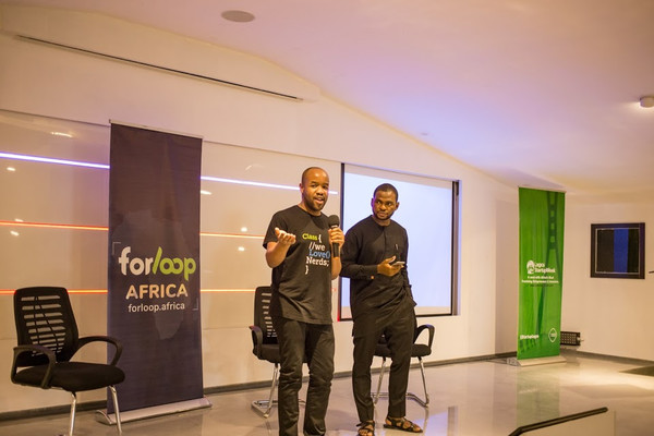 Graham Inghoko advocating for Africa’s Talking while Prosper Otemuyiwa looks on